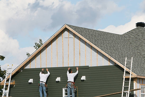 Professional Emergency Siding Repair technician working in Strongstown, PA